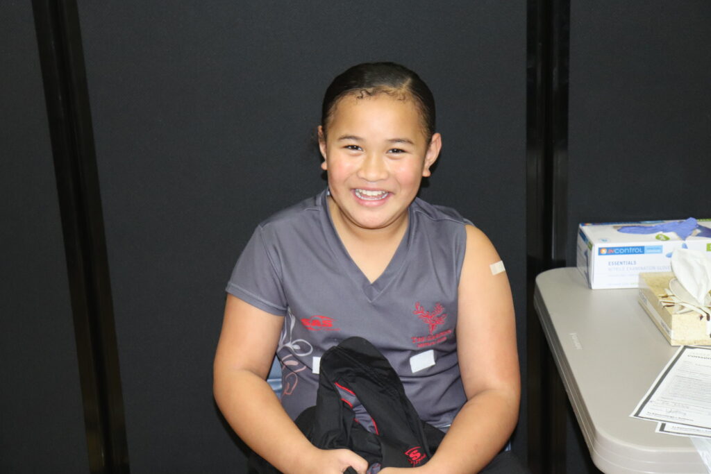 Straight from playing on the netball court, to getting her immunisations on the basketball court, manukau 2023